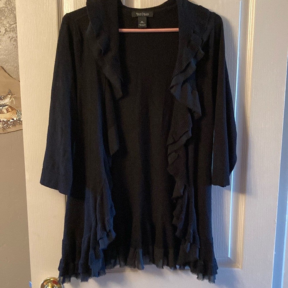 3/4 length sleeves and ruffled trim with sheer fabric layer